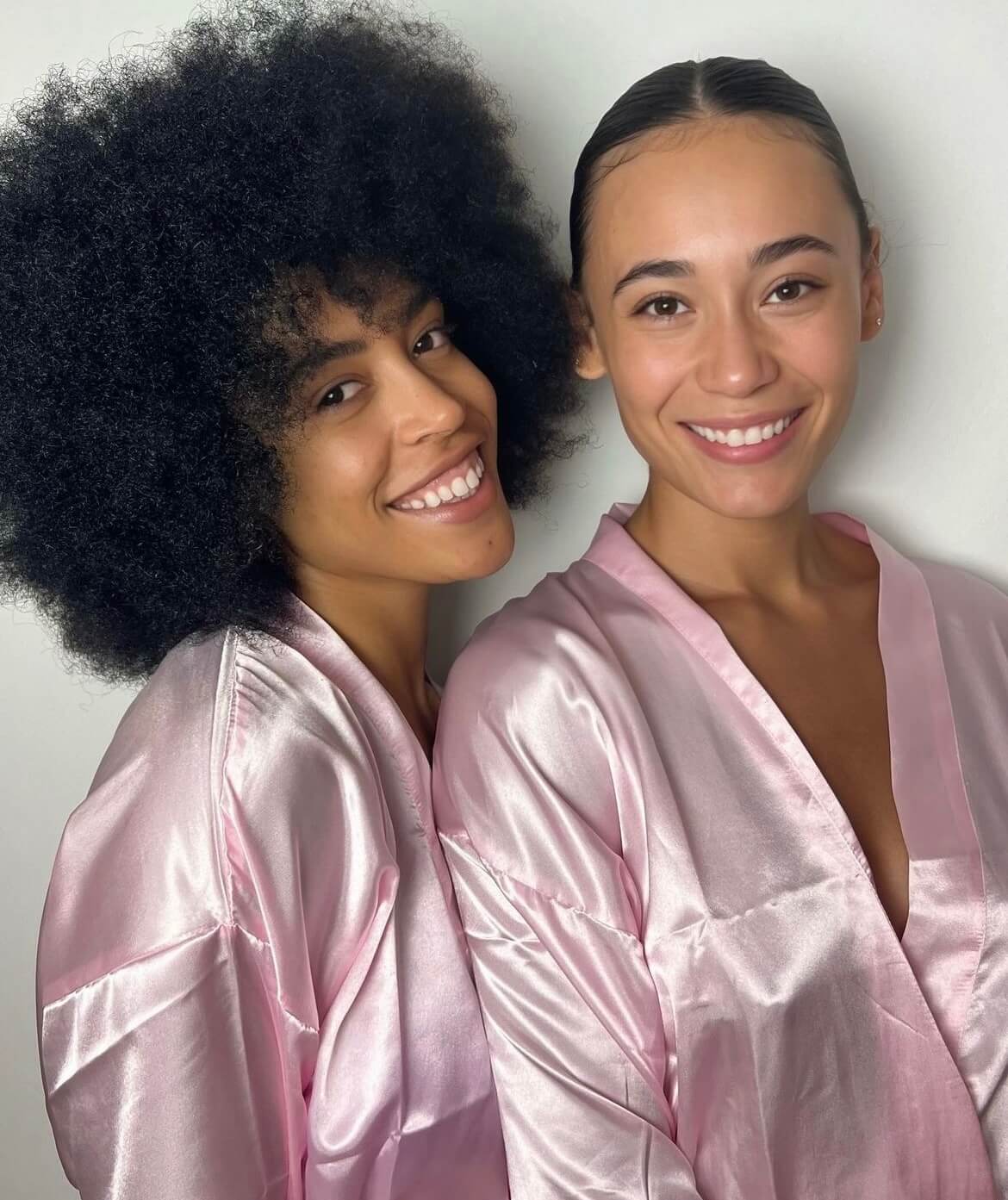 Besties glowing from spray tan.