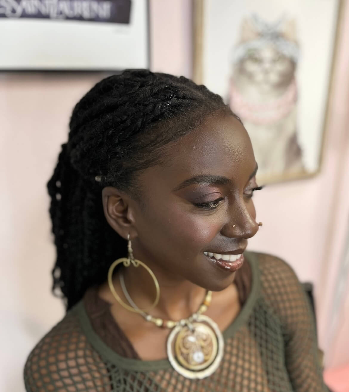 Gorgeous woman with dark skin with makeup done by #YBL.